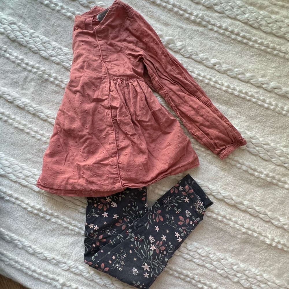 Pink long sleeve top and flower design leggings.